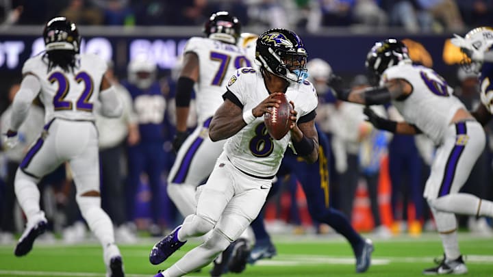 Nov 25, 2024; Inglewood, California, USA; Baltimore Ravens quarterback Lamar Jackson (8) moves out to pass against the Los Angeles Chargers during the first half at SoFi Stadium. Mandatory Credit: Gary A. Vasquez-Imagn Images Nov 25, 2024; Inglewood, California, USA; Baltimore Ravens quarterback Lamar Jackson (8) moves out to pass against the Los Angeles Chargers during the first half at SoFi Stadium. Mandatory Credit: Gary A. Vasquez-Imagn Images