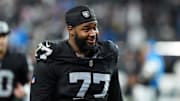 Dec 14, 2023; Paradise, Nevada, USA;  Las Vegas Raiders offensive tackle Thayer Munford Jr. (77) smiles after the game against the Los Angeles Chargers at Allegiant Stadium. Mandatory Credit: Stephen R. Sylvanie-Imagn Images