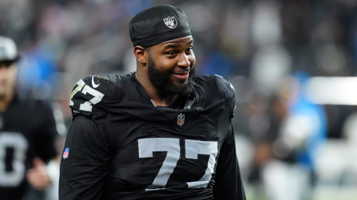 Dec 14, 2023; Paradise, Nevada, USA;  Las Vegas Raiders offensive tackle Thayer Munford Jr. (77) smiles after the game against the Los Angeles Chargers at Allegiant Stadium. Mandatory Credit: Stephen R. Sylvanie-USA TODAY Sports