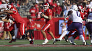 Nov 22, 2025; Houston, Texas, USA; Houston Cougars quarterback Conner Weigman (1) looks for an open receiver during the first quarter against the TCU Horned Frogs at TDECU Stadium. 