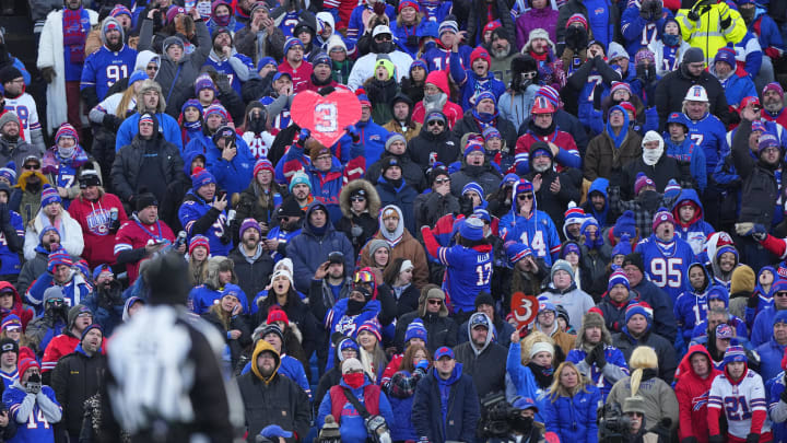 Jan 15, 2023; Orchard Park, NY, USA; Buffalo Bills fans cheer against the Miami Dolphins during the second half in a NFL wild card game at Highmark Stadium. Mandatory Credit: Gregory Fisher-USA TODAY Sports