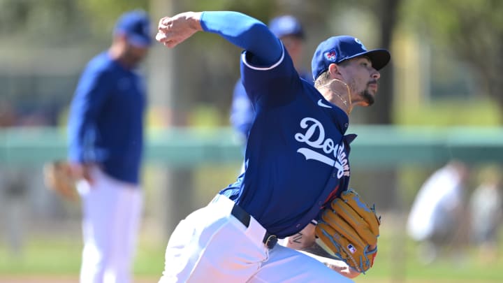 Feb 18, 2024; Glendale, AZ, USA;  Los Angeles Dodgers relief pitcher Ricky Vanasco (61) throws batting practice at spring training at Camelback Ranch. Mandatory Credit: Jayne Kamin-Oncea-USA TODAY Sports