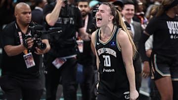 Oct 20, 2024; Brooklyn, New York, USA; New York Liberty guard Sabrina Ionescu (20) celebrates after defeating the Minnesota Lynx in game five of the 2024 WNBA Finals at Barclays Center. Mandatory Credit: Wendell Cruz-Imagn Images