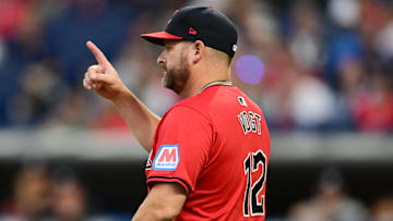 Sep 16, 2024; Cleveland, Ohio, USA; Cleveland Guardians manager Stephen Vogt (12) calls to the bullpen during the third inning against the Minnesota Twins at Progressive Field. 