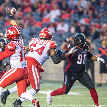 Jun 15, 2023; Ottawa, Ontario, CAN; Quarteback Jake Maier of the Calgary Stampeders (12) throws the ball in the first half against the Ottawa Redblacks at TD Place. Mandatory Credit: Marc DesRosiers-Imagn Images