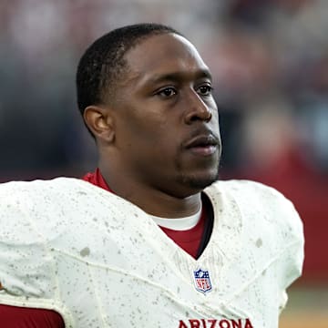 Sep 25, 2025; Glendale, Arizona, USA; Arizona Cardinals running back Emari Demercado (31) against the Seattle Seahawks at State Farm Stadium. Mandatory Credit: Mark J. Rebilas-Imagn Images
