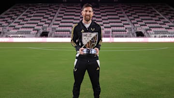 Dec 4, 2024; Ft. Lauderdale, Florida, USA; Inter Miami CF forward Lionel Messi (10) holds the London Donovan MVP Award during a presentation ceremony at Chase Stadium. Mandatory Credit: Sam Navarro-Imagn Images