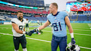 Jacksonville Jaguars tight end Josiah Deguara (81) shakes hands with Tennessee Titans tight end Josh Whyle (81) after the game at Nissan Stadium in Nashville, Tenn., Sunday, Dec. 8, 2024.