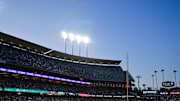 Apr 2, 2025; Los Angeles, California, USA; Los Angeles Dodgers pitcher Ben Casparius (78) throws against Atlanta Braves outfielder Michael Harris II (23) during the sixth inning at Dodger Stadium. Mandatory Credit: Gary A. Vasquez-Imagn Images