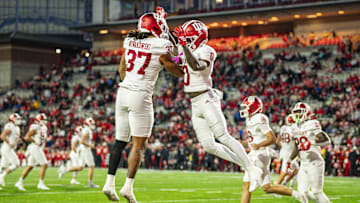 Nov 1, 2025; College Park, Maryland, USA;  Indiana Hoosiers wide receiver Jonathan Brady (0) celebrates with Indiana Hoosiers tight end Riley Nowakowski (37) after scoring a touchdown during the second half against the Maryland Terrapins  at SECU Stadium. Mandatory Credit: Tommy Gilligan-Imagn Images