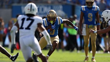 UCLA Bruins running back Jalen Berger (0) runs with the ball  Mandatory Credit: Kiyoshi Mio-Imagn Images