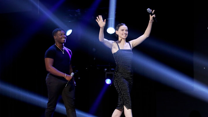 ANAHEIM, CALIFORNIA - AUGUST 24: (L-R) John Boyega and Daisy Ridley of 'Star Wars: The Rise of Skywalker' took part today in the Walt Disney Studios presentation at Disney’s D23 EXPO 2019 in Anaheim, Calif. 'Star Wars: The Rise of Skywalker' will be released in U.S. theaters on December 20, 2019. (Photo by Jesse Grant/Getty Images for Disney)