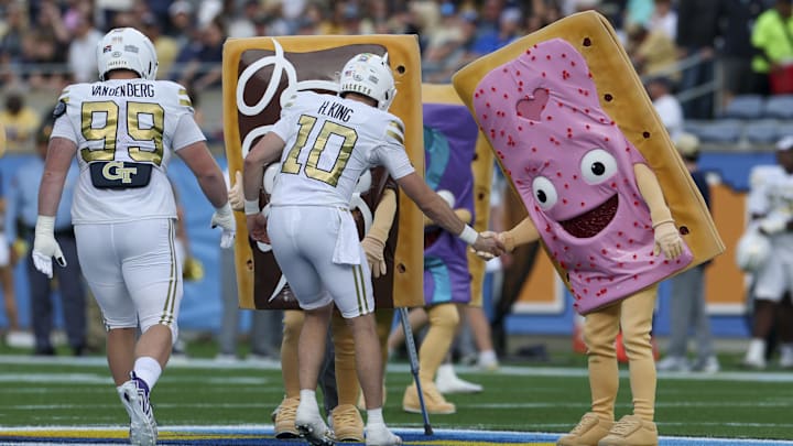 Georgia Tech quarterback Haynes King shook hands with the Pop-Tarts mascots ahead of kickoff