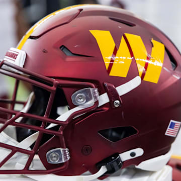 Detailed view of a Washington Commanders helmet at State Farm Stadium. Mandatory Credit: Mark J. Rebilas-Imagn Images