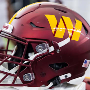 Detailed view of a Washington Commanders helmet at State Farm Stadium. Mandatory Credit: Mark J. Rebilas-Imagn Images