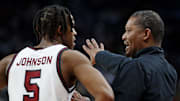 Mar 21, 2024; Pittsburgh, PA, USA; South Carolina Gamecocks head coach Lamont Paris talks to South Carolina Gamecocks guard Meechie Johnson (5) during the first half of the game against the Oregon Ducks in the first round of the 2024 NCAA Tournament at PPG Paints Arena. Mandatory Credit: Charles LeClaire-USA TODAY Sports