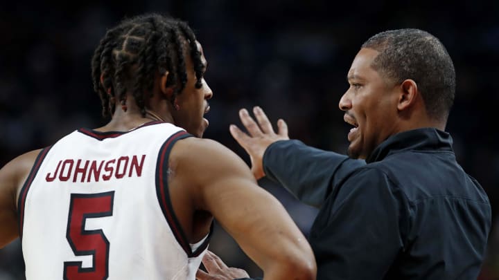 Mar 21, 2024; Pittsburgh, PA, USA; South Carolina Gamecocks head coach Lamont Paris talks to South Carolina Gamecocks guard Meechie Johnson (5) during the first half of the game against the Oregon Ducks in the first round of the 2024 NCAA Tournament at PPG Paints Arena. Mandatory Credit: Charles LeClaire-USA TODAY Sports