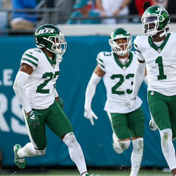 Dec 15, 2024; Jacksonville, Florida, USA; New York Jets cornerback Sauce Gardner (1) celebrates after an interception against the Jacksonville Jaguars in the fourth quarter at EverBank Stadium. Mandatory Credit: Nathan Ray Seebeck-Imagn Images
