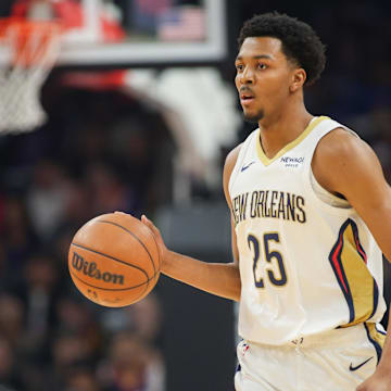 Feb 27, 2025; Phoenix, Arizona, USA; New Orleans Pelicans guard Trey Murphy III (25) dribbles against the Phoenix Suns in the first quarter at Footprint Center. Mandatory Credit: Brett Davis-Imagn Images