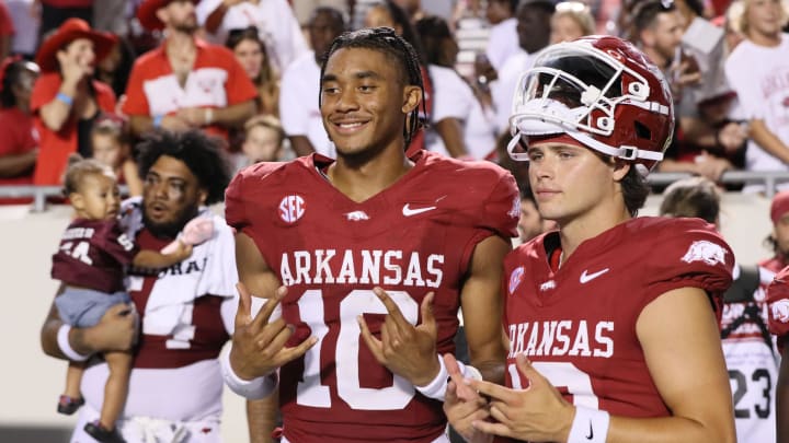 Aug 29, 2024; Little Rock, Arkansas, USA; Arkansas Razorbacks quarterback Taylor Green (10) celebrates with teammates after the game against the Pine Bluff Golden Lions at War Memorial Stadium. Arkansas won 70-0. Mandatory Credit: Nelson Chenault-USA TODAY Sports