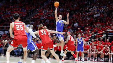 Egor Demin puts up a shot against Utah