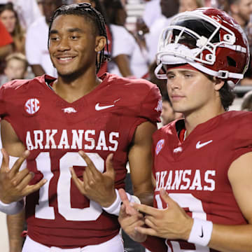 Arkansas Razorbacks quarterback Taylen Green (10) celebrates with teammates after the game against the Pine Bluff Golden Lions at War Memorial Stadium. Arkansas won 70-0.