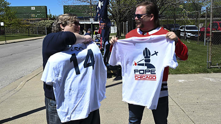 Fans show off Pope Leo XIV jerseys before the game against the Miami Marlins at Rate Field.