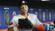 Apr 22, 2025; Houston, Texas, USA; Houston Astros right fielder Cam Smith (11) stands in the dugout before the game against the Toronto Blue Jays at Daikin Park.