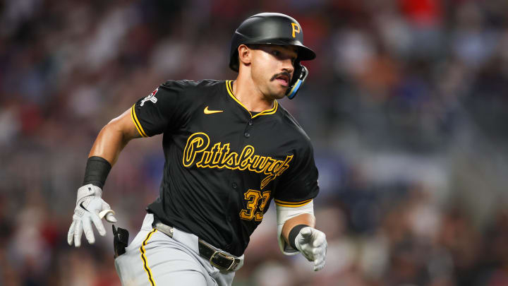 Jun 28, 2024; Atlanta, Georgia, USA; Pittsburgh Pirates second baseman Nick Gonzales (39) hits a ground-rule double against the Atlanta Braves in the seventh inning at Truist Park. Mandatory Credit: Brett Davis-USA TODAY Sports