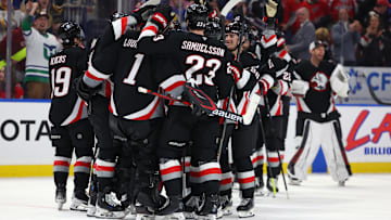 Jan 6, 2025; Buffalo, New York, USA;  The Buffalo Sabres celebrate a shootout win over the Washington Capitals at KeyBank Center. Mandatory Credit: Timothy T. Ludwig-Imagn Images