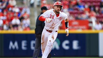 Apr 13, 2025; Cincinnati, Ohio, USA; Cincinnati Reds catcher Austin Wynns (38) runs to third on a double hit by outfielder TJ Friedl (not pictured) in the third inning against the Pittsburgh Pirates at Great American Ball Park. Mandatory Credit: Katie Stratman-Imagn Images