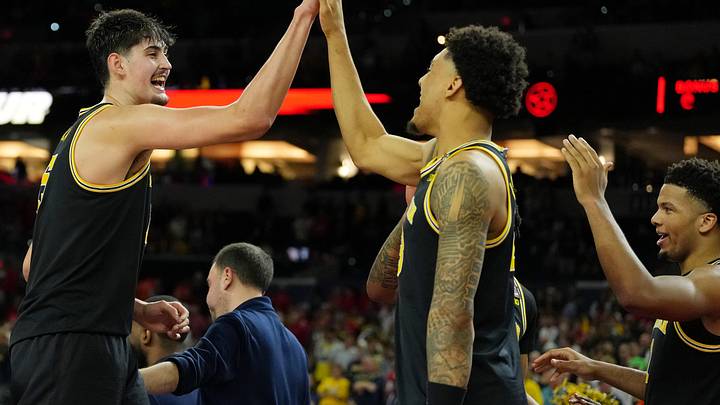 Apr 4, 2026; Indianapolis, IN, USA; Michigan Wolverines center Aday Mara (15) high fives forward Yaxel Lendeborg (23) during the second half in a semifinal of the Final Four of the men's 2026 NCAA Tournament at Lucas Oil Stadium. Mandatory Credit: Bob Donnan-Imagn Images