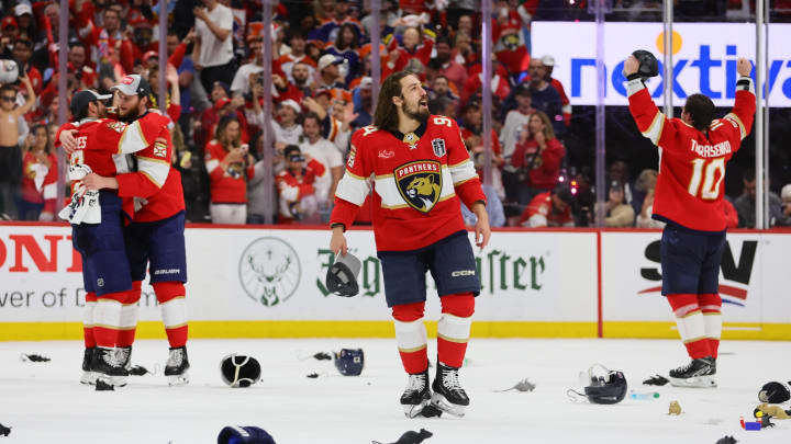 Jun 24, 2024; Sunrise, Florida, USA; Florida Panthers left wing Ryan Lomberg (94) celebrates after game seven of the 2024 Stanley Cup Final against the Edmonton Oilers at Amerant Bank Arena. Mandatory Credit: Sam Navarro-USA TODAY Sports