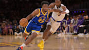 Oct 12, 2025; Los Angeles, California, USA;  Golden State Warriors guard LJ Cryer (18) is defended by Los Angeles Lakers guard Bronny James (9) as he drives to the basket during the second half at Crypto.com Arena.
