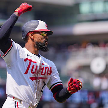 Jul 12, 2025; Minneapolis, Minnesota, USA; Minnesota Twins outfielder Byron Buxton (25) celebrates his home run for the cycle against the Pittsburgh Pirates in the seventh inning at Target Field.
