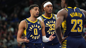 Mar 14, 2025; Philadelphia, Pennsylvania, USA; Indiana Pacers guard Tyrese Haliburton (0) reacts with teammates against the Philadelphia 76ers in the second quarter at Wells Fargo Center. Mandatory Credit: Kyle Ross-Imagn Images