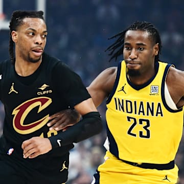 May 13, 2025; Cleveland, Ohio, USA; Cleveland Cavaliers guard Darius Garland (10) drives to the basket against Indiana Pacers forward Aaron Nesmith (23) during the first quarter of game five of the second round for the 2025 NBA Playoffs at Rocket Arena. Mandatory Credit: Ken Blaze-Imagn Images