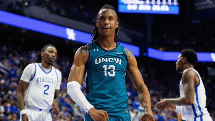 Dec 2, 2023; Lexington, Kentucky, USA; North Carolina-Wilmington Seahawks forward Trazarien White (13) celebrates during the first half against the Kentucky Wildcats at Rupp Arena at Central Bank Center. Mandatory Credit: Jordan Prather-USA TODAY Sports