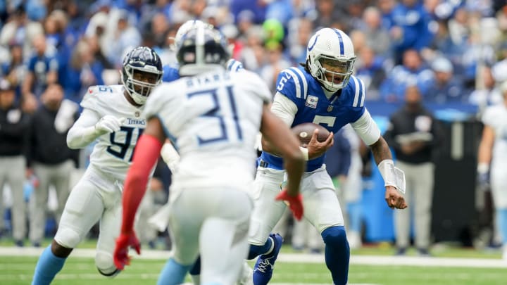 Indianapolis Colts quarterback Anthony Richardson (5) looks to run with the ball Sunday, Oct. 8, 2023, during a game against the Tennessee Titans at Lucas Oil Stadium in Indianapolis.