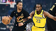 May 13, 2025; Cleveland, Ohio, USA; Cleveland Cavaliers guard Darius Garland (10) drives to the basket against Indiana Pacers forward Aaron Nesmith (23) during the first quarter of game five of the second round for the 2025 NBA Playoffs at Rocket Arena. Mandatory Credit: Ken Blaze-Imagn Images