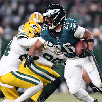 Philadelphia Eagles running back Saquon Barkley (26) rushes the ball against the Green Bay Packers in last year's playoffs.