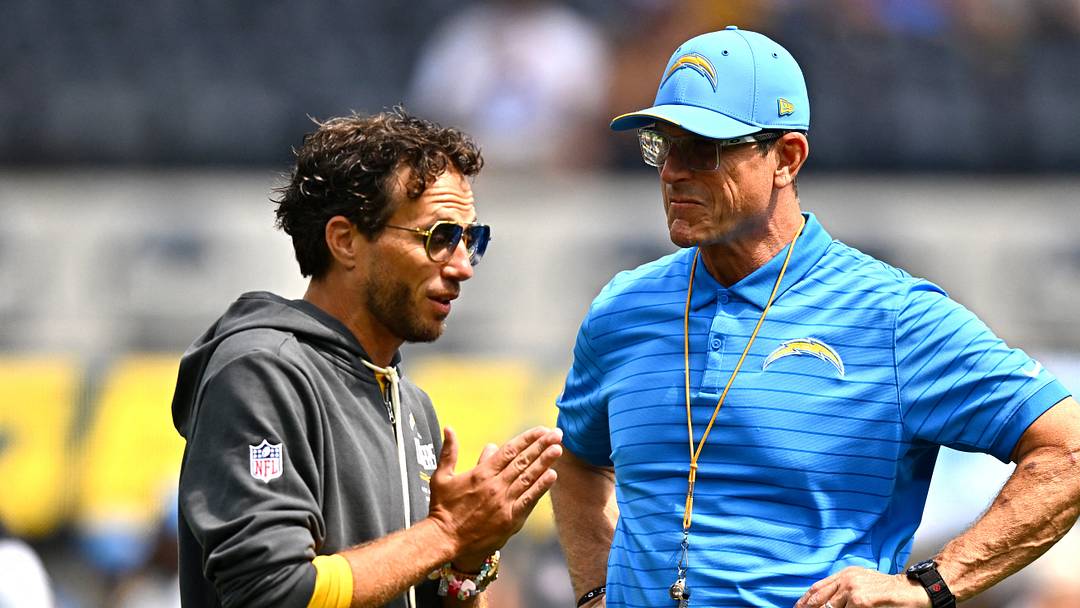 Sep 13, 2026; Inglewood, California, USA;  Los Angeles Chargers head coach Jim Harbaugh stands on the field with offensive coordinator Mike McDaniel prior to a game against the Arizona Cardinals at SoFi Stadium.at SoFi Stadium.  Mandatory Credit: William Liang-Imagn Images