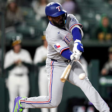 Apr 23, 2025; West Sacramento, California, USA; Texas Rangers right fielder Adolis Garcia (53) hits a ground ball to record an RBI against the Athletics in the sixth inning at Sutter Health Park. 