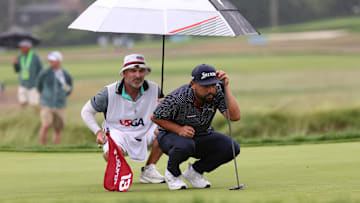 PGA Tour golfer JJ Spaun prepares to putt on the 13th green during the final round of the U.S. Open golf tournament