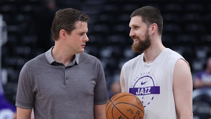 Mar 21, 2026; Salt Lake City, Utah, USA; Utah Jazz head coach Will Hardy (left) and guard Svi Mykhailiuk (right) speak before the game against the Philadelphia 76ers at Delta Center. Mandatory Credit: Rob Gray-Imagn Images