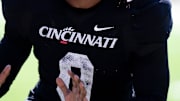 Cincinnati Bearcats defensive back Matthew McDoom (0) runs a drill during the Cincinnati Bearcats football spring practice at Nippert Stadium on Saturday, April 12, 2025.