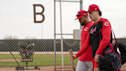 Cincinnati Reds non-roster invitee Sal Stewart walks with Barry Larkin between fields at the Cincinnati Reds Player Development Complex in Goodyear, Ariz., on  Wednesday, Feb. 12, 2025. Mandatory Credit: Sam Greene/USA TODAY NETWORK via Imagn Images