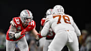 Ohio State Buckeyes defensive end Jack Sawyer rushes against Texas Longhorns offensive lineman Kelvin Banks Jr.