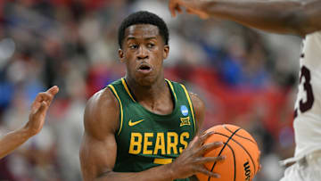 Baylor Bears guard VJ Edgecombe has the ball against the Mississippi State Bulldogs.