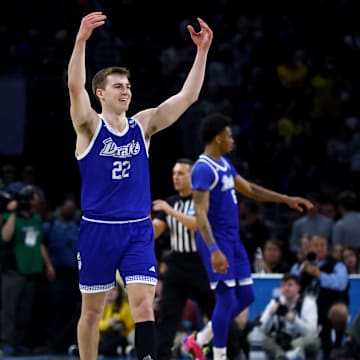 Drake guard Mitch Mascari celebrates. 